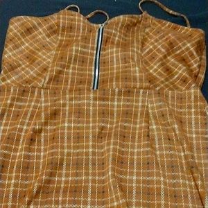 A brown dress with a zipper